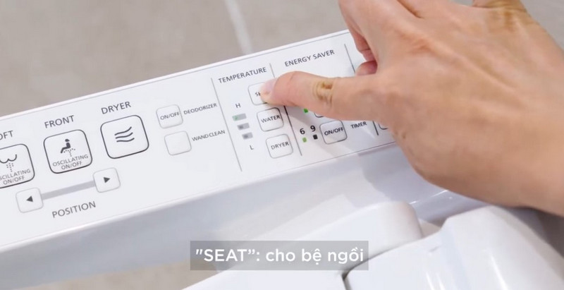 Làm thế nào để bật chế độ sưởi ấm bệ ngồi trên nắp rửa điện tử